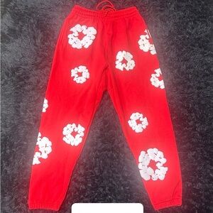 Stylish Red Sweatpants with White Floral Design